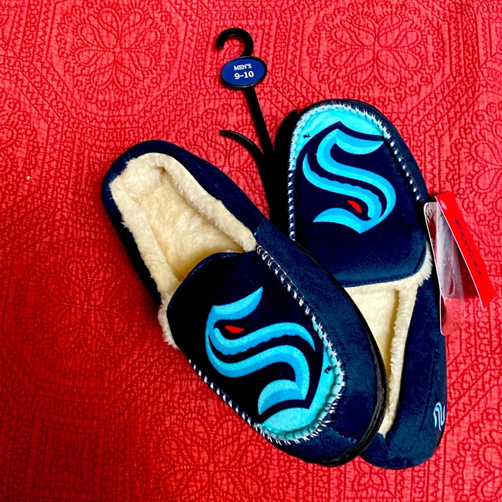 OFFICIAL NHL SEATTLE KRAKEN slippers. Cozy for the cold weather.